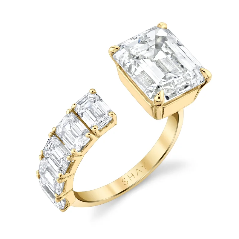 women’s unique engagement rings-DIAMOND FLOATING EMERALD CUT RING