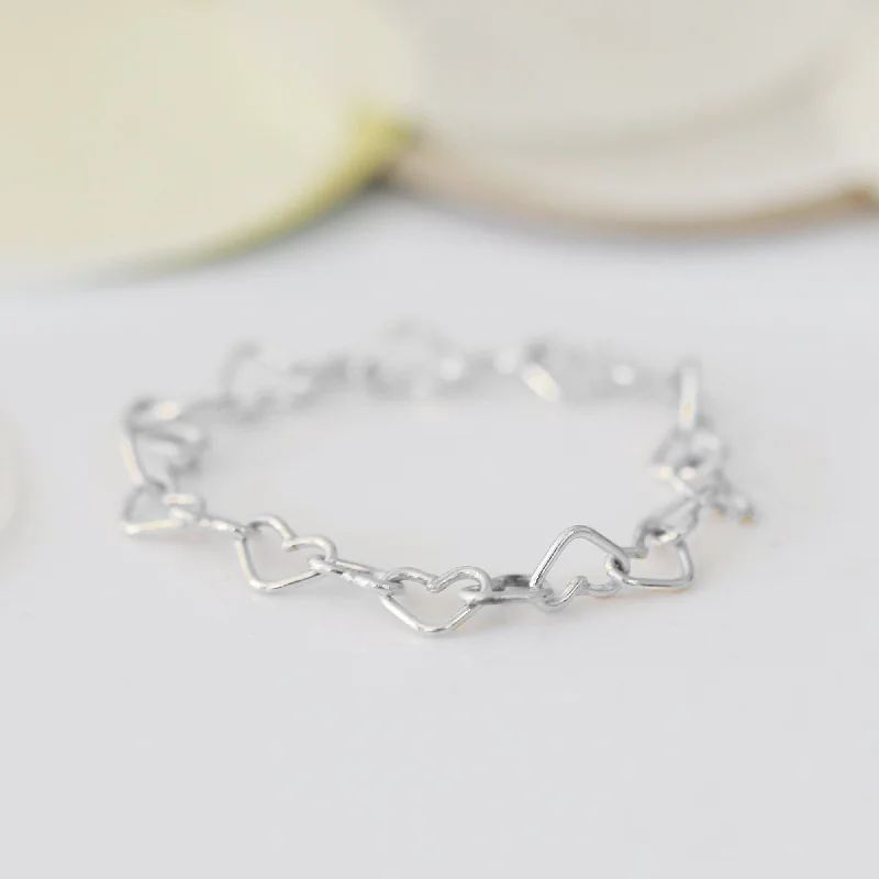 women’s luxury rings-CONNECTED HEART CHAIN RING