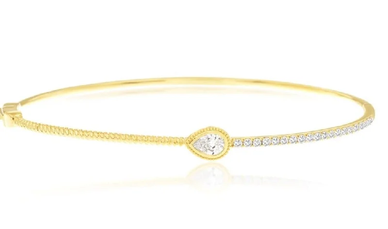 women’s elegant bangle bracelets-14k yellow gold center pear shaped diamond hinged bangle